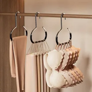 Multi-functional clothing hanger storage rack for closet space saving bra and pants holder.