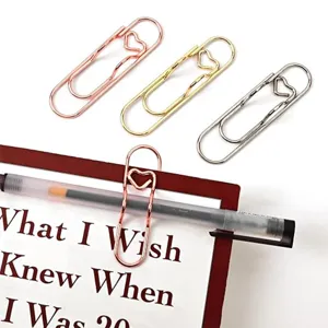 Metal heart paper clips and pen holders set, creative stationery for office and school use.
