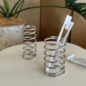 Portacepillos de Dientes de Metal Minimalista Espiral Hueco Estante de Almacenamiento de Escritorio Baño Organizador de Drenaje Pincel