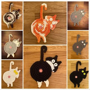 Vue détaillée de dessous de verre chat en crochet fait main montrant la texture de fil.