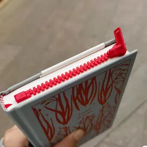 Creative zipper bookmark notebook with red zipper design, unique aesthetic stationery for reading.