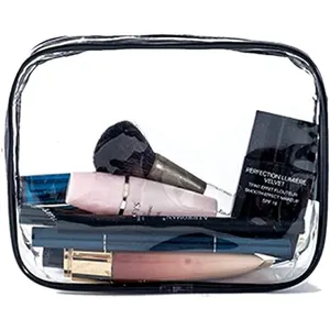 Clear PVC cosmetic bag with black trim, large capacity waterproof toiletry organizer for travel.