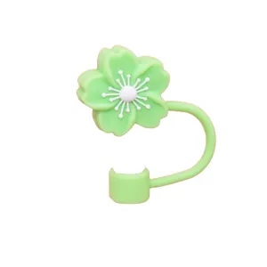 Silicone begonia flower straw cover detail, green reusable dust plug for 10mm drinking straws.