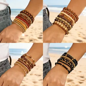 Bohemian multilayer stacked beaded bracelets showcased in a four-quadrant beach layout.
