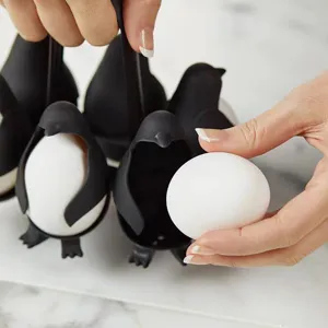 Detailed view of the cute penguin egg holder kitchen tool for boiling and storage.