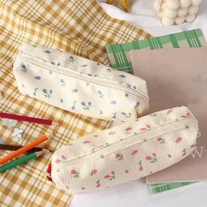 Jolie trousse à crayons en toile fleurie, pochette de rangement de papeterie mignonne et chic.