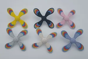 Colorful rotating propeller shoe charms for hole shoes and bogg bags, DIY decorative accessories.