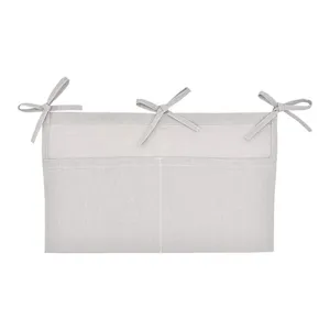 Baby crib hanging storage bag, linen double pocket organizer for diapers, toys and essentials.