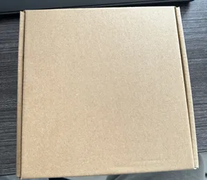 Close-up detail view of plain brown corrugated cardboard packaging box for outdoor bird feeder.