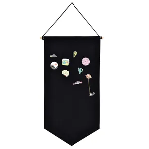 Black canvas enamel pin display banner, large hanging wall organizer with cute decorative brooches.