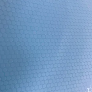 Blauwe waterdichte ladevoering detail textuur, plank mat close-up weergave nu.