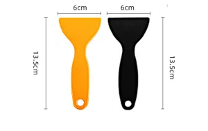 Detail shot of the plastic anti-slip tape scraper, showing dimensions, yellow and black color.