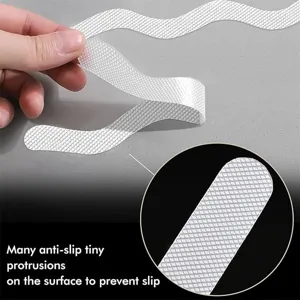 Close-up detail of transparent anti slip strip with textured diamond surface for safety use.