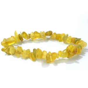 Pulsera de virutas de piedra natural amarilla con cuentas irregulares en cordón elástico