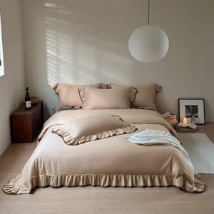 Cozy beige ruffle bedding set with soft duvet cover and pillowcases for elegant bedroom decor.