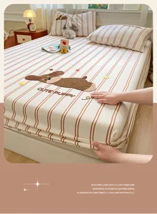 Cotton fitted sheet set with cute puppy embroidery and stylish brown stripes for bedroom decor.