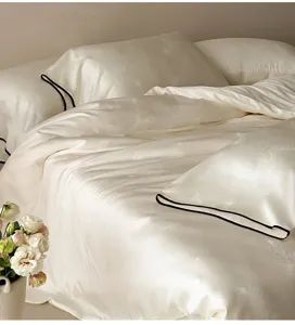 Detailed view of luxury Tencel jacquard duvet cover set with elegant feather pattern.
