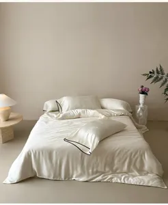 Detail view of smooth Tencel jacquard cooling ice silk 4-piece bedding set in elegant beige.