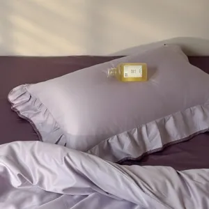 Purple solid color cotton bedding set with ruffled pillowcases, soft and comfortable for all seasons.