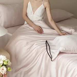 Luxurious soft pink Tencel jacquard bedding set with smooth cooling duvet cover and bed sheets.