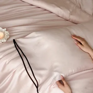 Luxurious silky tencel jacquard bedding set with cooling pillowcase and flat sheet.