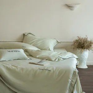 Luxurious washed tencel 4-piece bedding set with smooth lyocell fibers and contrast piping.