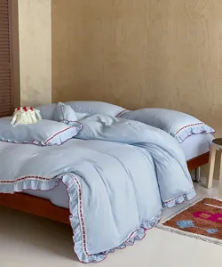 Juego de ropa de cama de gasa azul claro con lazos y volantes, suave, 4 piezas.