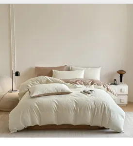 Luxurious jacquard cotton 4-piece bedding set in cream and brown, elegant bedroom decor.