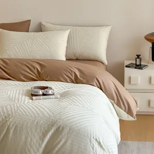 Modern cotton jacquard 4-piece bedding set with soft geometric pattern for bedroom decor.