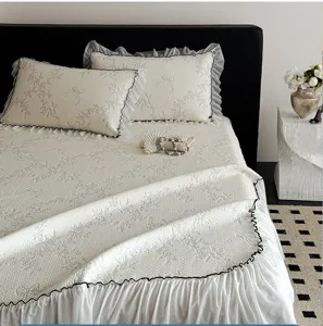 Korean style ice silk cooling bed mat detail view, elegant ruffled lace and jacquard bow pattern.