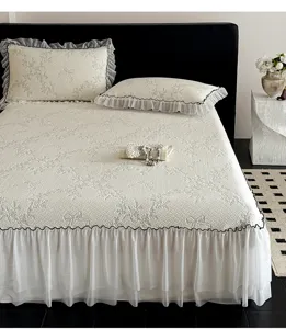 Detail view of Korean cooling ice silk bed skirt set featuring elegant floral jacquard design.
