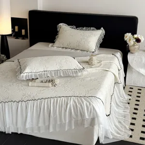 Korean style PE jacquard cooling ice silk bedding set with ruffled bed skirt and pillowcases.