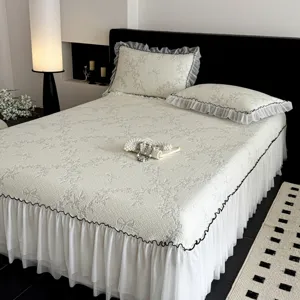 Korean style summer cooling ice silk jacquard bed skirt set with elegant lace and wavy trim.