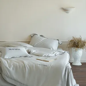 Luxury sand-washed Tencel bedding set, ice silk cooling Lyocell fabric with smooth texture.