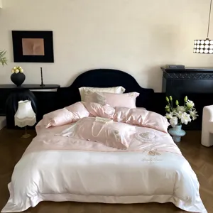 Luxury French 120-count Pima cotton jacquard satin four-piece bedding set, pink and white.