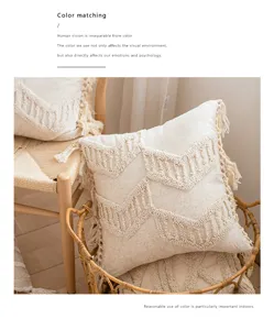 Bohemian throw pillow case with tufted geometric pattern and tassels for home sofa decor.