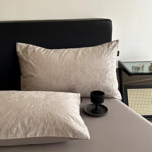 Pure cotton jacquard pillowcase detail shot featuring vintage floral pattern and thick weave.