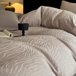 Luxurious jacquard cotton duvet cover set, textured retro bedding detail view, cozy bedroom style.