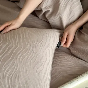 Pure cotton jacquard bedding set featuring textured wave design and vintage luxury duvet.