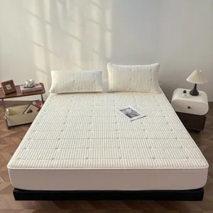 Quilted waterproof fitted mattress cover with clover embroidery, premium bedroom bed sheet protector.
