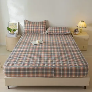 Retro katoenen hoeslaken met ruitjes en kussenslopen voor een gezellige en stijlvolle slaapkamer.