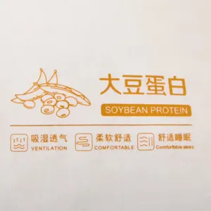 Soybean protein fiber pillow fabric detail with printed functional text and soft white texture