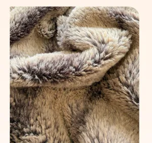 Close-up view of luxurious rabbit velvet plush blanket fabric showing soft wavy texture details.