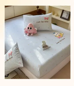 Cotton fitted sheet set with cute cartoon embroidery and pillowcases for bedroom.