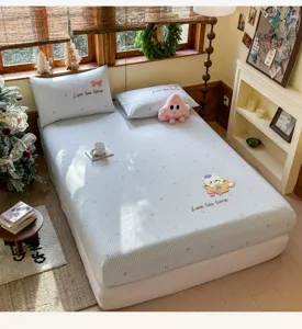 Detailed view of the cute cartoon towel embroidery cotton fitted sheet with matching pillowcases.