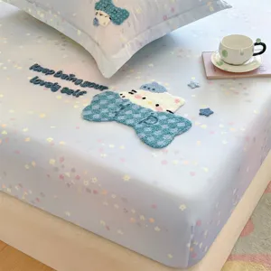 Cotton fitted sheet with cartoon cat embroidery and floral print, soft for cozy bedroom decor.