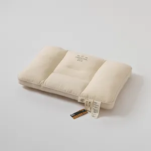 Comfortabele katoen-linden kussenkern met multi-sectie design voor goede slaapondersteuning.
