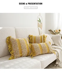 Housse de coussin bohème touffetée à franges, coussin décoratif jaune et blanc pour canapé.