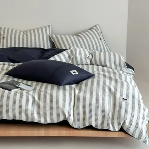 Schwarzes Waffel-Bettwäsche-Vierteiliges Set Baumwoll-Jacquard-Bettbezug Hauptansicht Bett