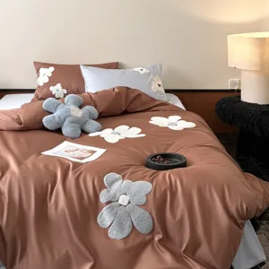 Luxury 100S long-staple cotton bedding set with 3D towel embroidery floral design for home.